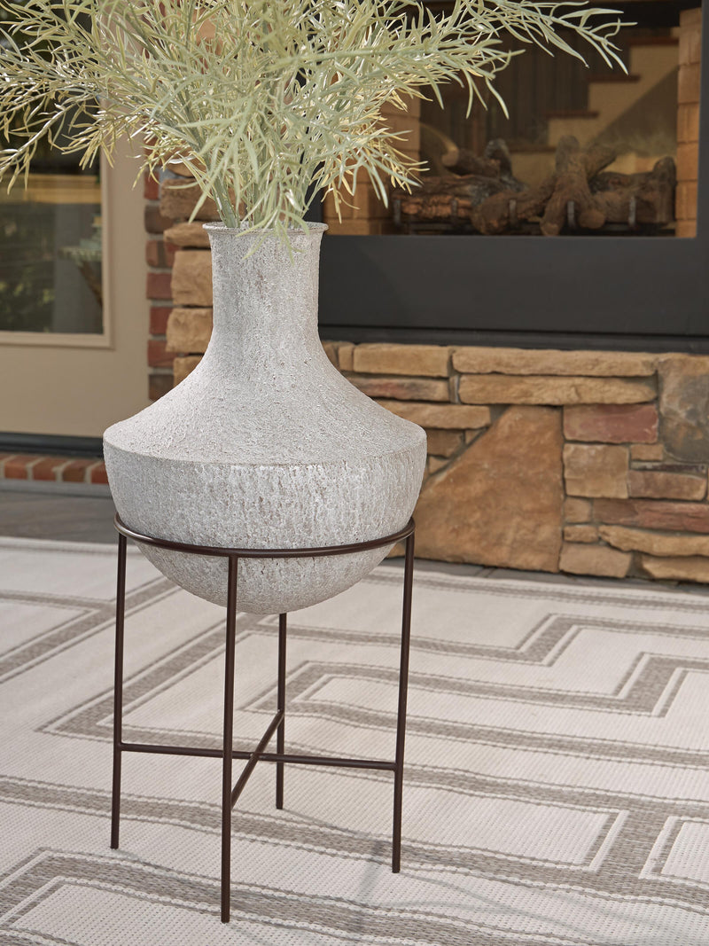 Ashley Furniture Estonbank Vase featuring a sleek, modern design with a textured surface, perfect for decorative display.