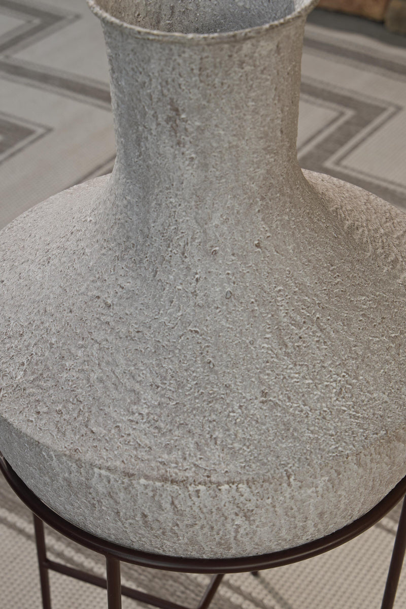 Ashley Furniture Estonbank vase with a sleek, modern design, featuring a smooth surface and neutral color.