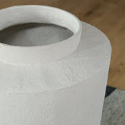 Ashley Furniture Flurinworth vase with intricate ceramic design, showcasing its elegant shape and textured surface.