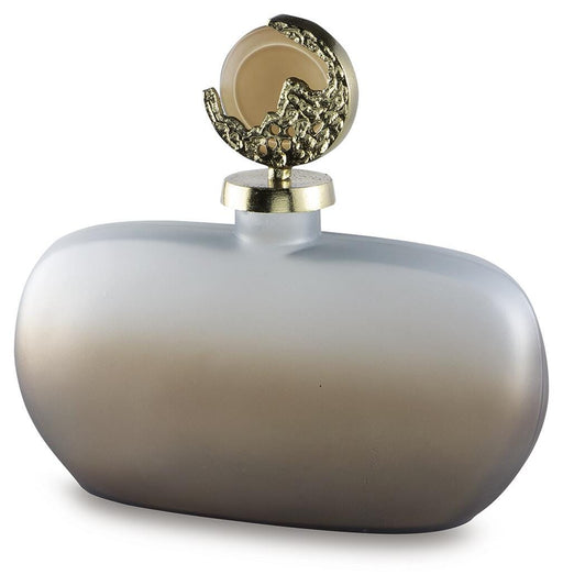 Ashley Furniture Acario Jar displaying a stylish ceramic jar with decorative patterns on a wooden surface.