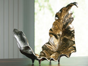Ashley Furniture Darinsen sculpture tray with intricate design, showcasing a decorative ceramic piece on a neutral background.