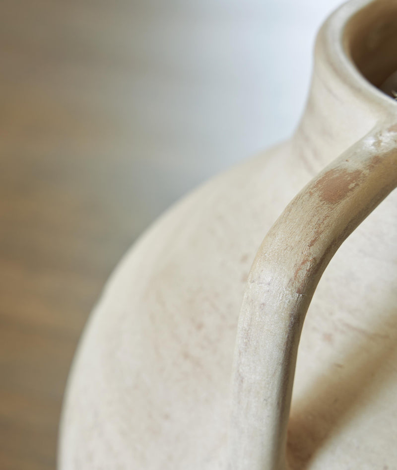 Close-up of the Ashley Furniture Justy Vase, showing its detailed design and elegant shape.