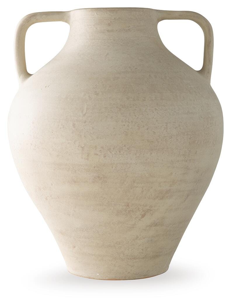 Elegant Ashley Furniture Justy Vase featuring a sleek design and neutral tones, perfect for decorative display.