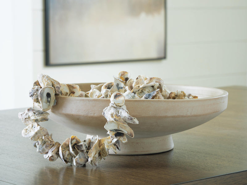 Ashley Furniture Justy Bowl, ceramic bowl with modern design and neutral finish, perfect for stylish table settings.