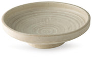 Ashley Furniture Justy Bowl, a stylish ceramic bowl with a modern design, perfect for serving or decorative use.