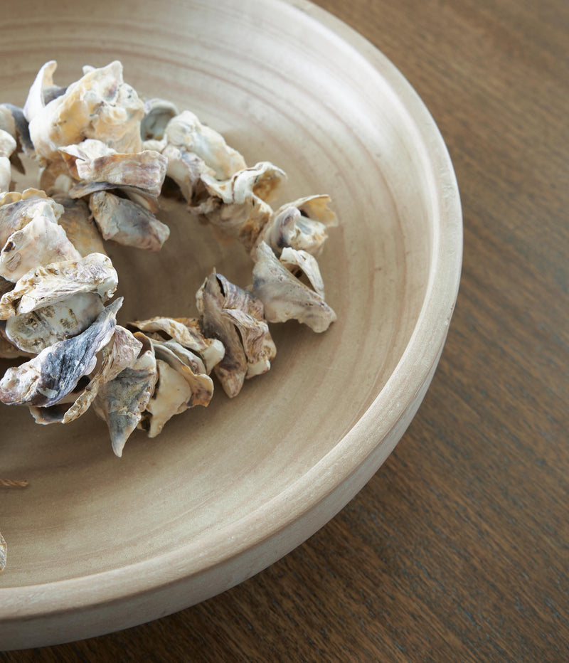 Ashley Furniture Justy Bowl, a stylish ceramic bowl with a modern design, perfect for dining or decor use.