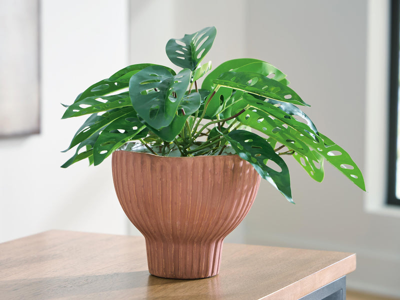 Ashley Furniture Orban vase with a sleek, modern design and smooth surface, ideal for decorative display.