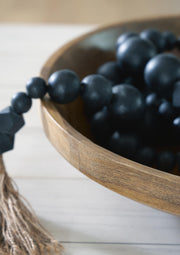 Clayburg Bowl by Ashley Furniture, a stylish ceramic bowl with intricate patterns and a glossy finish.