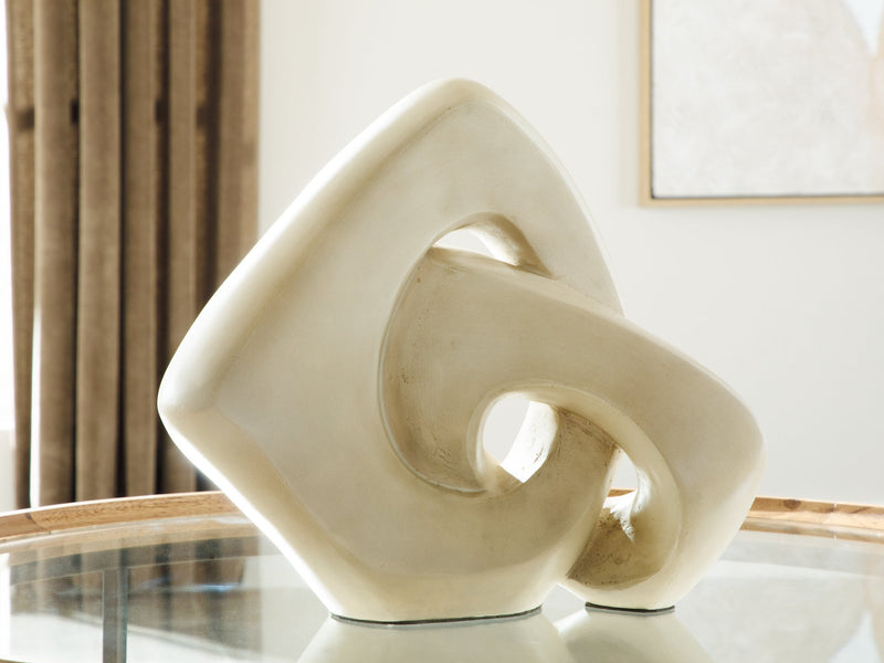 Ashley Furniture Feebs sculpture, modern abstract art piece with smooth curves and neutral tones, ideal for contemporary decor.