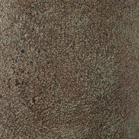 Ashley Furniture Jedwick vase, decorative ceramic vase with textured design, shown in a neutral color on a wooden surface.