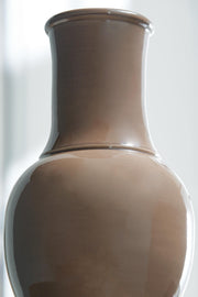 Ashley Furniture Tillmer Vase with a sleek, modern design, featuring a smooth ceramic finish in neutral tones.