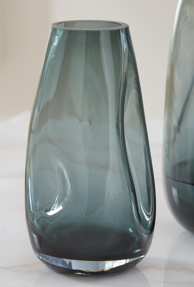 Set of two Ashley Furniture Beamund vases with sleek, modern design, featuring smooth surfaces and neutral tones.