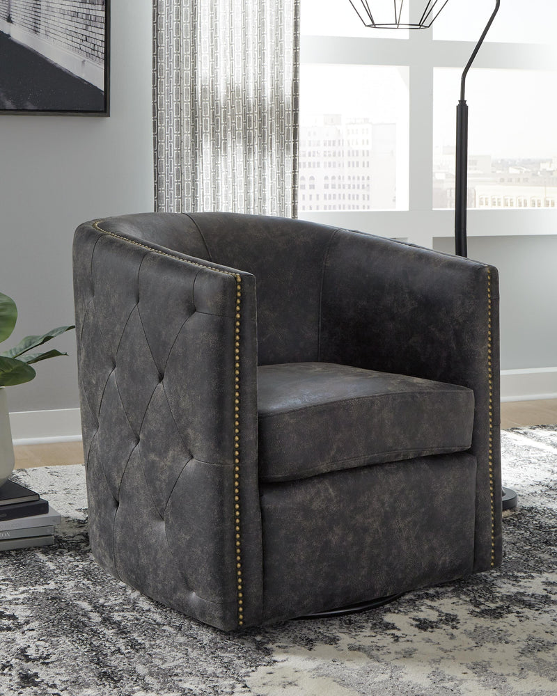 Ashley Furniture Brentlow swivel accent chair with plush fabric and wooden legs, shown in a modern living room setting.