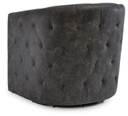 Ashley Furniture Brentlow swivel accent chair with plush fabric and a modern design, shown from the back view.