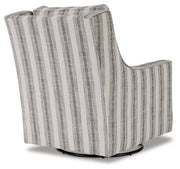 Ashley Furniture Kambria swivel glider accent chair with plush fabric and a modern design, shown from the back view.