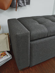 Ashley Furniture Cortwell Storage Bench with wooden top and fabric upholstered base, ideal for entryways or living rooms.