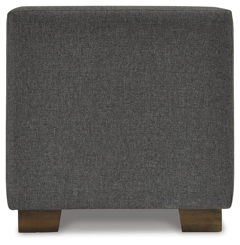 Ashley Furniture Cortwell storage bench with cushioned top and wooden legs, perfect for entryways or living rooms.