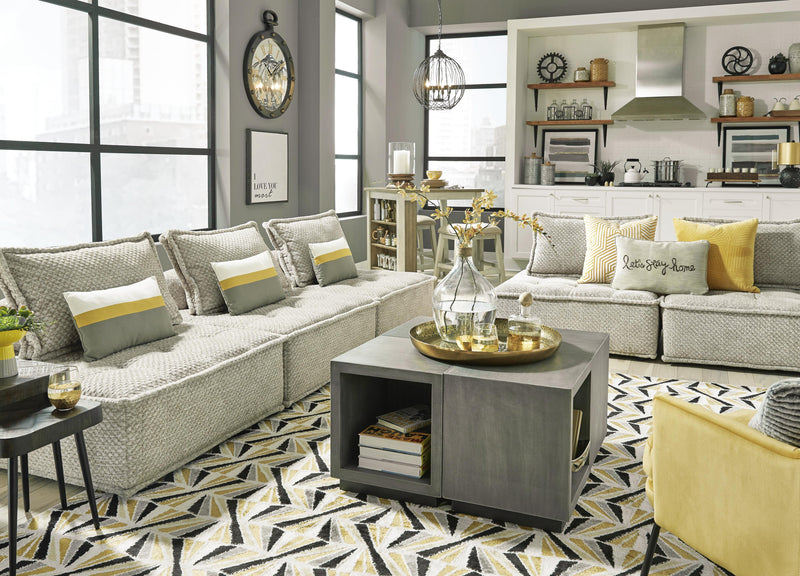 Ashley Furniture Bales accent chair with plush fabric upholstery and wooden legs, showcasing a stylish and comfortable seating option.