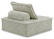 Ashley Furniture Bales accent chair with plush fabric and wooden legs, shown from the back in a modern living room setting.