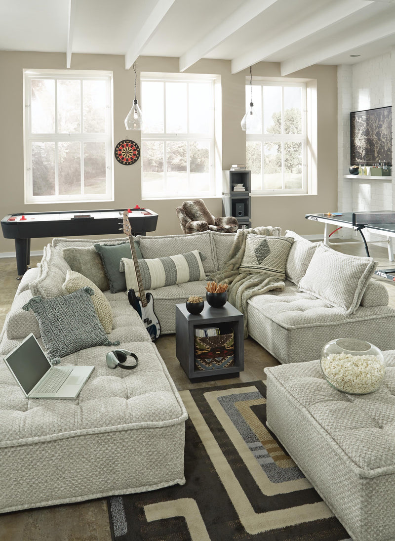 Ashley Furniture Bales accent chair with plush fabric and wooden legs, featuring a modern design and comfortable cushioning.