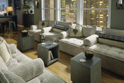 Ashley Furniture Bales accent chair with plush fabric upholstery and wooden legs, showcasing a stylish and comfortable seating option.