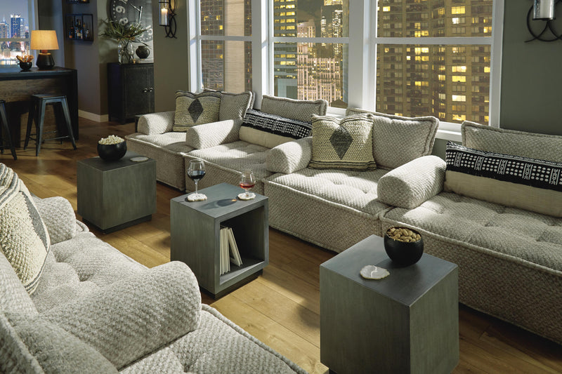 Ashley Furniture Bales accent chair with plush fabric upholstery and wooden legs, showcasing a stylish and comfortable seating option.
