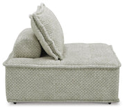 Ashley Furniture Bales accent chair with plush fabric and modern design, shown from a side angle in a stylish living room setting.