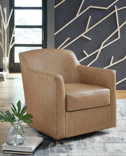 Ashley Furniture Bradney swivel accent chair with plush fabric and modern design, showing its cozy seat and stylish armrests.