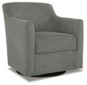 Ashley Furniture Bradney swivel accent chair with plush fabric and a modern design, shown from an angle.
