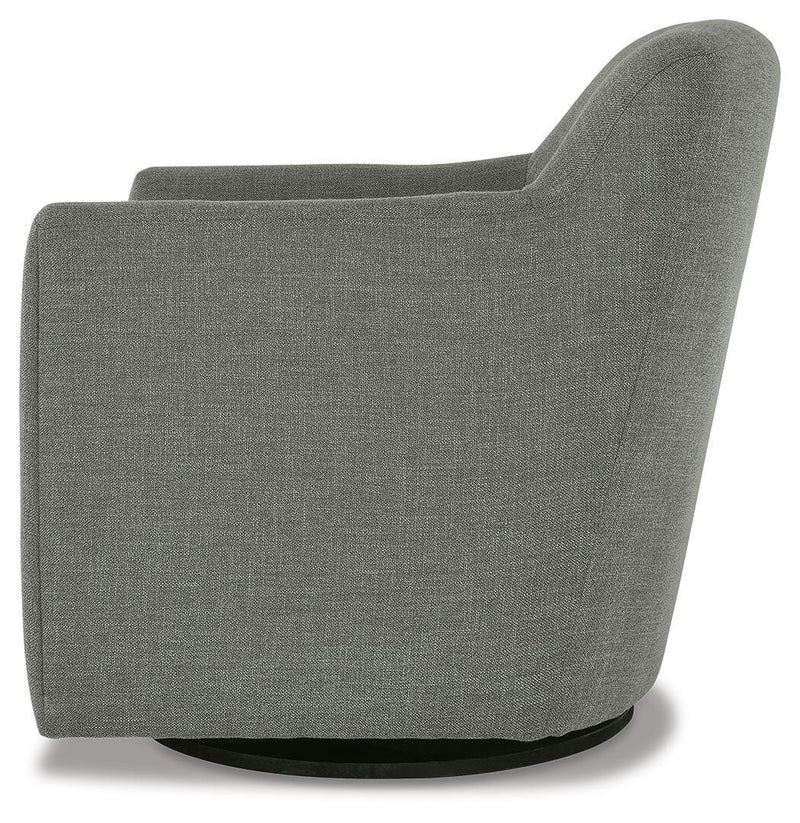 Ashley Furniture Bradney swivel accent chair with plush fabric and modern design, shown from a side angle.