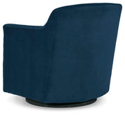 Ashley Furniture Bradney swivel accent chair with plush upholstery and modern design, shown from the back in this image.