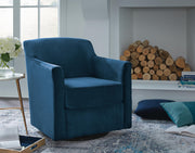 Ashley Furniture Bradney swivel accent chair with plush upholstery and a modern design, shown in a cozy living room setting.