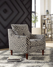 Ashley Furniture Morrilton Next-Gen Nuvella Accent Chair with plush fabric and modern design, shown in a cozy living room setting.