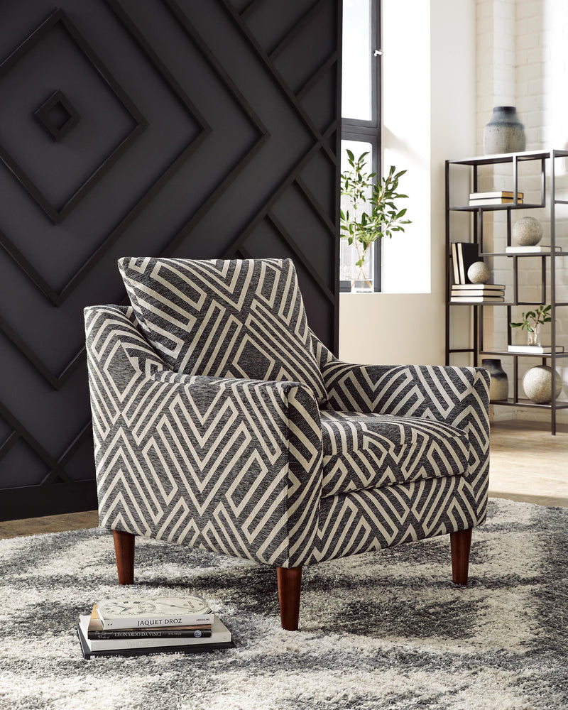 Ashley Furniture Morrilton Next-Gen Nuvella Accent Chair with plush fabric and modern design, shown in a cozy living room setting.