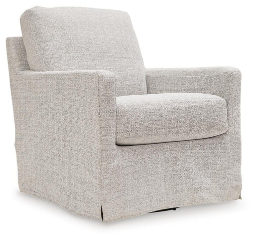 Ashley Furniture Nenana Next-Gen Nuvella swivel accent chair with plush upholstery and modern design, shown from an angled side view.