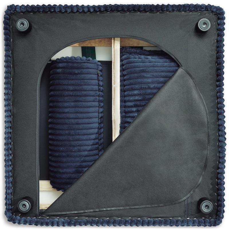 Ashley Furniture Bales accent chair with plush upholstery and wooden legs, shown in a detailed open view.