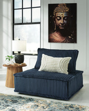 Ashley Furniture Bales accent chair with cushioned seat and backrest, featuring stylish upholstery and wooden legs.