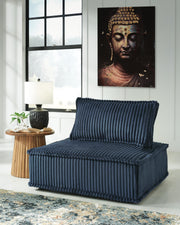 Ashley Furniture Bales accent chair with plush upholstery and wooden legs, showcasing a stylish and comfortable seating option.
