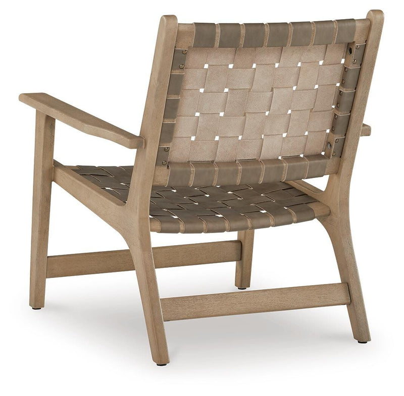 Ashley Furniture Jameset accent chair with plush upholstery and wooden legs, shown from the back in a modern living room setting.