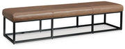 Ashley Furniture Joston accent bench with wooden legs and upholstered seat, shown from an angled side view.