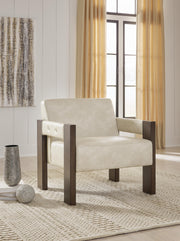 Ashley Furniture Adlanlock accent chair with plush upholstery and wooden legs, ideal for living room or bedroom decor.