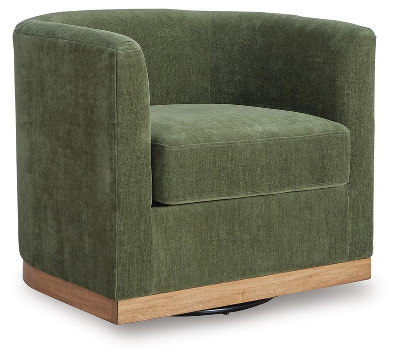 Ashley Furniture Jersonlow swivel accent chair with plush fabric and modern design, shown from an angled side view.