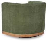 Ashley Furniture Jersonlow swivel accent chair with plush upholstery and wooden legs, shown from the back view.