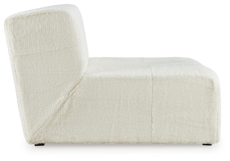 Ashley Furniture Brettner accent chair with a sleek design and plush upholstery, shown from a side view.