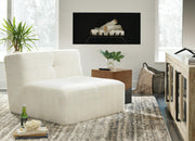 Ashley Furniture Brettner Accent Chair with plush fabric and wooden legs, shown in a cozy living room setting.