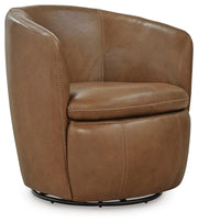 Ashley Furniture Kierreys swivel accent chair with a modern design and plush fabric, shown from an angled side view.