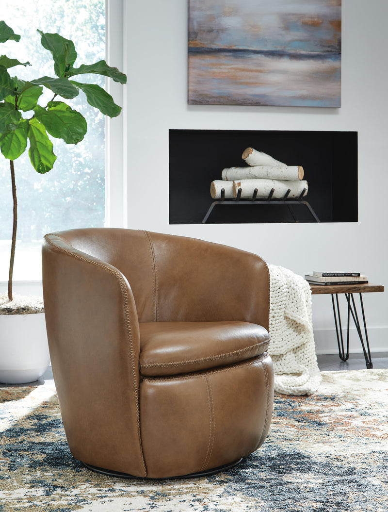 Ashley Furniture Kierreys Swivel Accent Chair with plush fabric and modern design, shown from a front angle in a stylish living room setting.