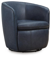 Ashley Furniture Kierreys swivel accent chair with plush upholstery and modern design, shown from an angled side view.