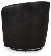 Ashley Furniture Kierreys swivel accent chair with wooden legs and plush fabric upholstery, shown from the back view.