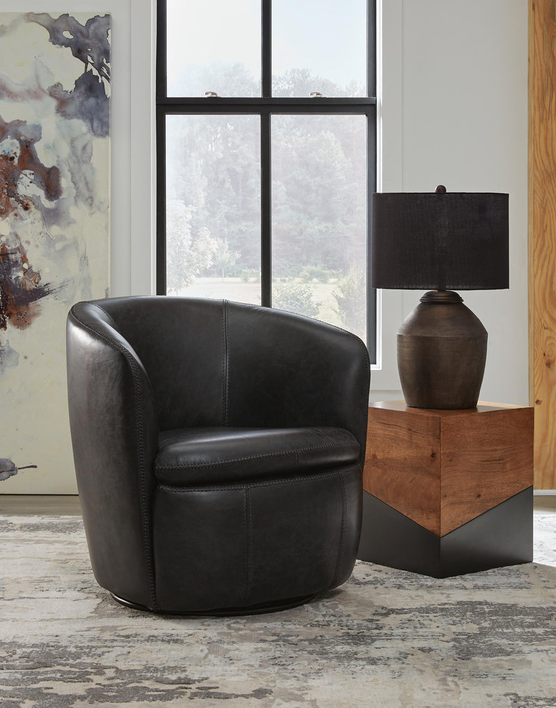 Ashley Furniture Kierreys Swivel Accent Chair with cushioned seat and back, featuring a stylish, modern design.